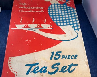 Juego de té infantil de hojalata litografiada de Ohio Art en su caja original.