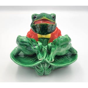 May include: A rustic wooden sign with the text "Welcome to our home" in white lettering. The sign features a distressed finish and a simple, inviting design, perfect for a front porch or entryway.