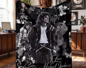 May include: Black and white blanket featuring multiple images of Michael Jackson. The blanket has the text "I Love Michael Jackson" in a decorative script. The images include portraits and performance shots of the singer.