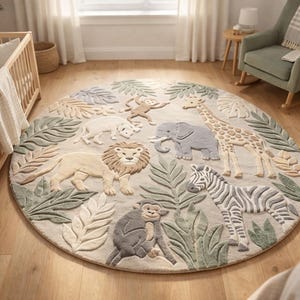 May include: A circular nursery rug with a jungle animal design. The rug has a beige backdrop with raised images of a lion, zebra, giraffe, elephant, monkey, and other animals. Green and beige leaves surround the animals.