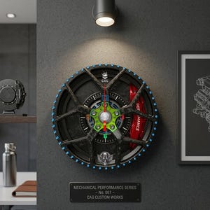 May include: A black and carbon fiber wall clock with a car wheel design. The clock features a red brake caliper, blue accents, and the text "PERFORMANCE". The clock is mounted on a gray wall with a framed engine diagram.