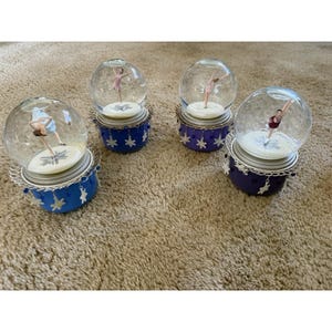 Ensemble de 4 boules à neige musicales Hallmark pour les Jeux olympiques de Salt Lake City, 2002
