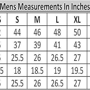 May include: A black and white sizing chart titled Mens Measurements In Inches. The table lists sizes from XXS to 5XL with corresponding measurements in inches for chest, waist, sleeves, shoulders, and length. The grid displays numerical data.