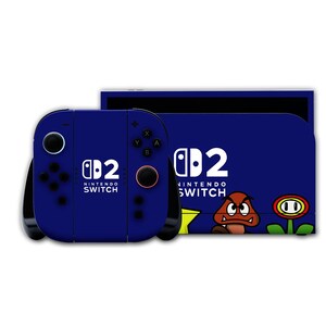 May include: A blue Nintendo Switch console and controllers. The console has the text "Nintendo Switch" and the number "2" in white. The back of the console features a cartoon Goomba and a flower.