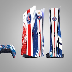 May include: A PlayStation 5 console and controller set featuring a design inspired by the Paris Saint-Germain football club. The console has a white, red, and blue color scheme with the club's logo. The controller has a matching design.