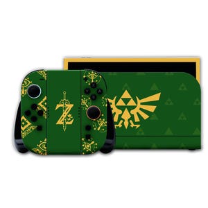 May include: A green and gold Nintendo Switch console with a matching controller. The console and controller feature a design inspired by The Legend of Zelda, with iconic symbols and imagery.