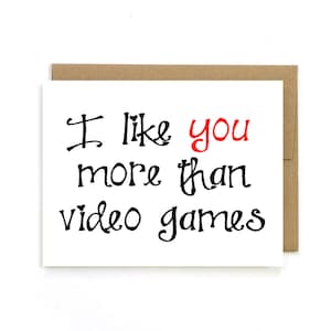 Biglietto di San Valentino "Mi piaci più dei videogiochi" Biglietto di auguri di StrangerDays