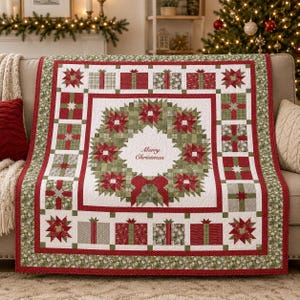 May include: A rectangular quilt featuring a central wreath pattern made of red and green fabric stars surrounding the text Merry Christmas. The border consists of alternating red and green gift box blocks and star motifs in a festive color palette.