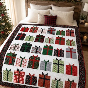 May include: A quilt featuring a repeating pattern of gift boxes in various holiday-themed fabrics, including red, green, black, white, and grey colors. Each block depicts a square present with a contrasting ribbon and bow, finished with a dark border.
