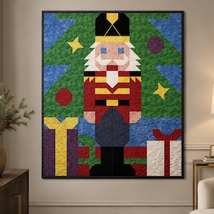 May include: A rectangular quilt featuring a pixelated nutcracker design in red, black, yellow, and white. The nutcracker stands before a green triangular tree shape against a blue background, with yellow stars, a red circle, and purple circles.