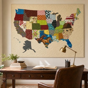 May include: A large rectangular wall hanging featuring a quilted map of the United States. Each state is represented by a different fabric patch with various colors, patterns, and textures, including a horse graphic on the Texas section.