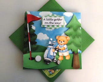 Little golfer baby shower card.