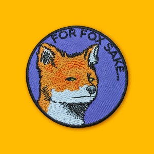 May include: Purple embroidered patch with a fox face and the text "FOR FOX SAKE."