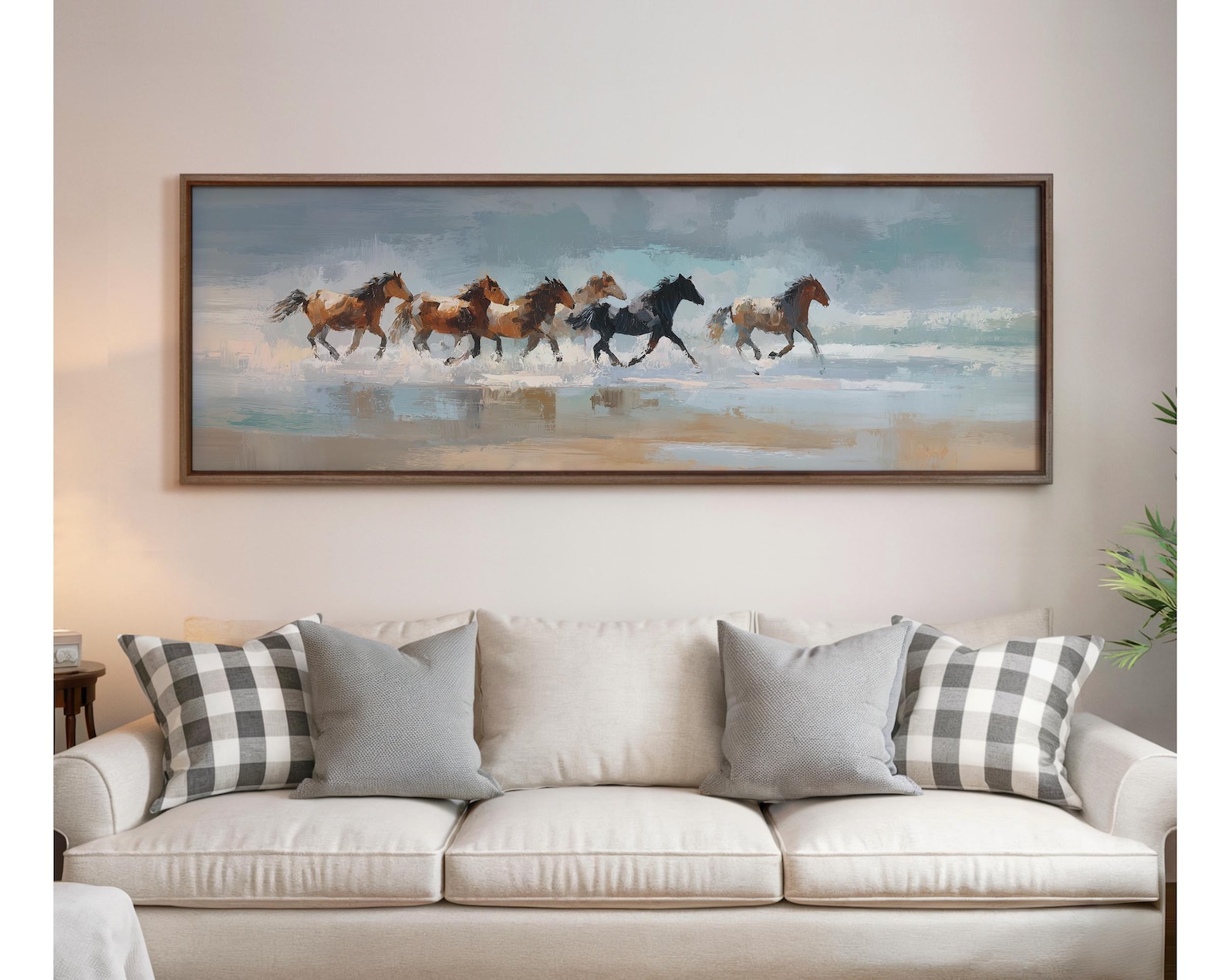 Coastal cowgirl wall art featuring horses walking along a beach shoreline for a cowgirl coastal bedroom