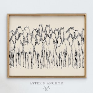 May include: A framed print featuring a sketch of a herd of horses in black and white. The artwork has a neutral background and is enclosed in a gold-colored frame. The text "ASTER & ANCHOR" is at the bottom.
