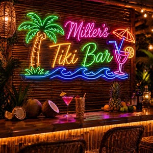 May include: A neon sign displaying the text Miller's Tiki Bar in pink, yellow, and green, accompanied by a green palm tree, blue ocean waves, and a pink cocktail with an umbrella. The sign is mounted on a bamboo wall above a bar counter.