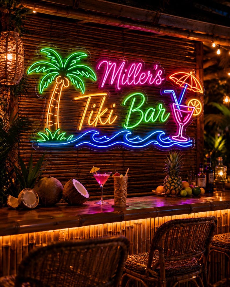 May include: A neon sign displaying the text Miller's Tiki Bar in pink, yellow, and green, accompanied by a green palm tree, blue ocean waves, and a pink cocktail with an umbrella. The sign is mounted on a bamboo wall above a bar counter.