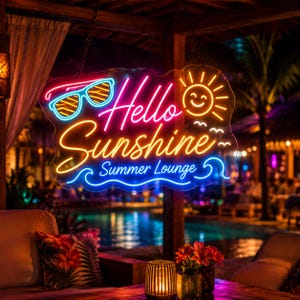 May include: A neon sign featuring the text Hello Sunshine Summer Lounge in pink, orange, and blue. The sign includes a glowing blue pair of sunglasses, a yellow sun icon, and blue wave graphics, all suspended by chains against a dark background.