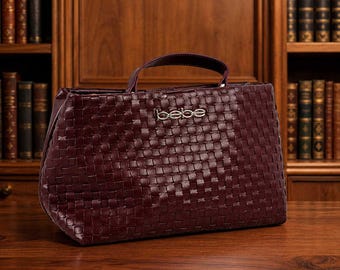 bebe Yara Burgundy Woven Satchel Bag, Small Structured Top Handle Handbag Description