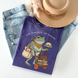 Comfort Colors® We Haggle At Dawn T-Shirt, Funny Frog Graphic Shirt for Thrift Lover, Thrifting Girl Gifts, Vintage Collector Gift, Shirt