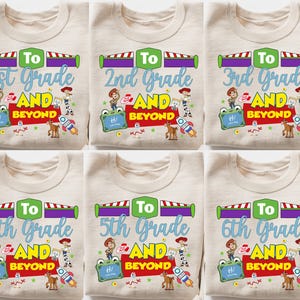 May include: A collection of six beige crewneck sweatshirts, each featuring a graphic print with the text To [Grade] AND BEYOND. The design includes cartoon characters, a rocket, a green chalkboard, and colorful stars on a light background.