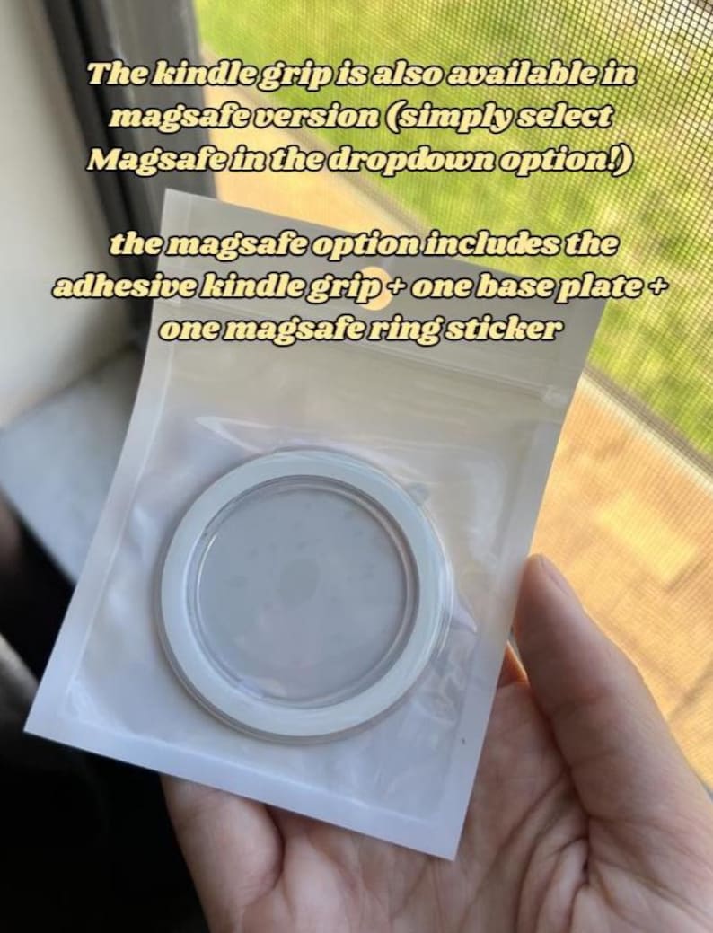 May include: A white and clear Kindle grip in a clear plastic package. The text on the package says the MagSafe option includes an adhesive Kindle grip, a base plate, and a ring sticker.