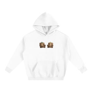 May include: White hoodie with a kangaroo pocket and a hood. The design features two cartoon teddy bears sitting in brown armchairs. One bear wears a green hat, and the other wears a crown. The design is centered on the chest.