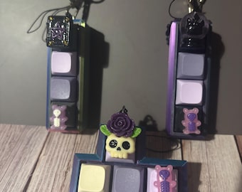 Spooky Purple Potion Fidget Clicker and lanyard