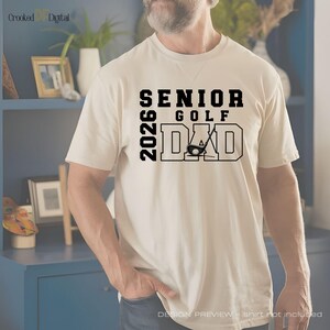 Senior Golf Dad 2026 PNG digital design in a varsity-style layout with bold athletic lettering and solid block text, shown on a transparent background for printing on shirts and other physical products