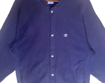 Maglione vintage Champion con doppia tasca e bottoni a pressione, modello Reverse Weave.