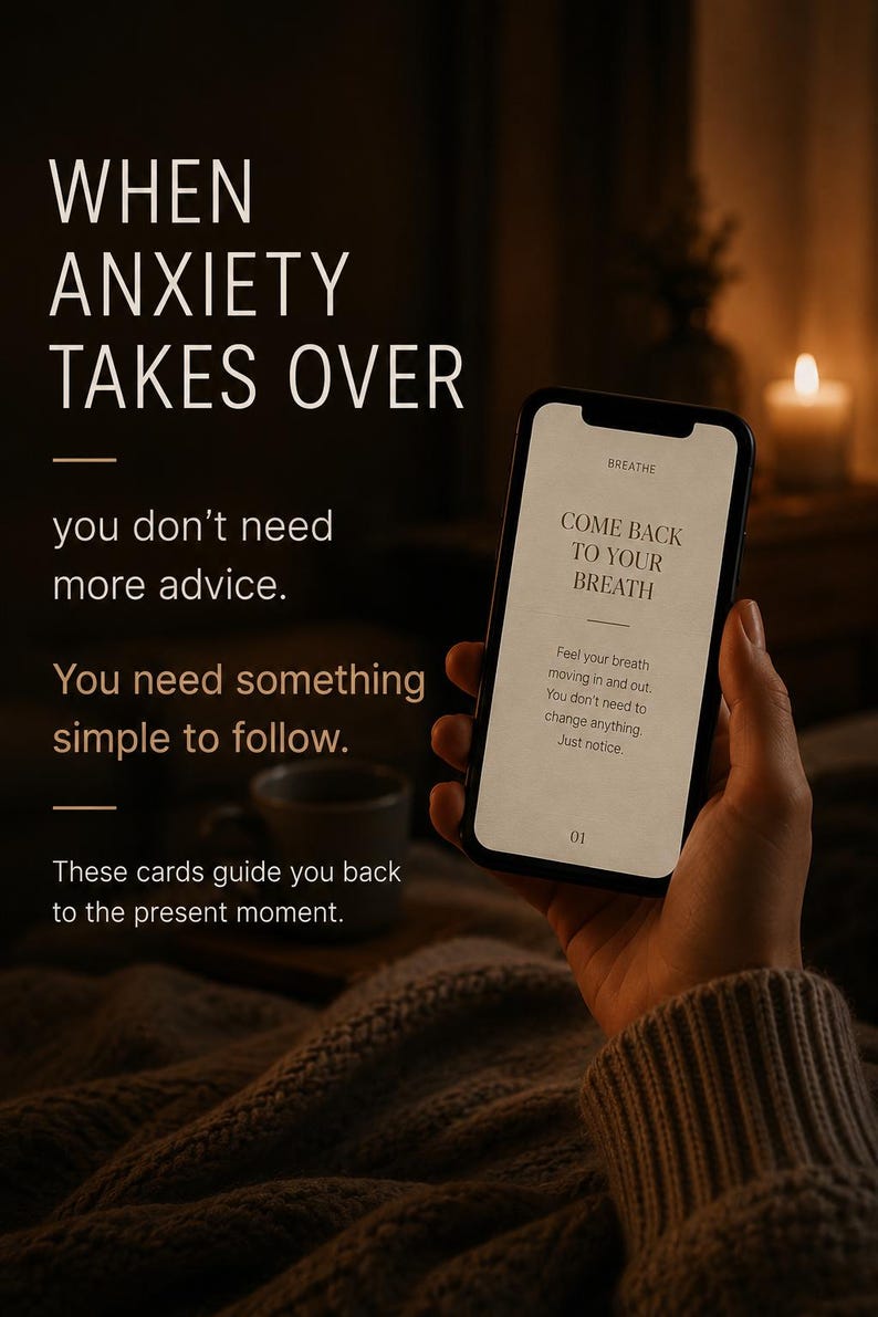 May include: A smartphone displaying text that reads: BREATHE, COME BACK TO YOUR BREATH, Feel your breath moving in and out. You don't need to change anything. Just notice. 01. The screen is held against a dark background with text overlay.