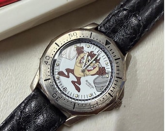 Zegarek Armitron Looney Tunes Tasmanian Devil z 1994 roku Taz 2200/144P z kopertą