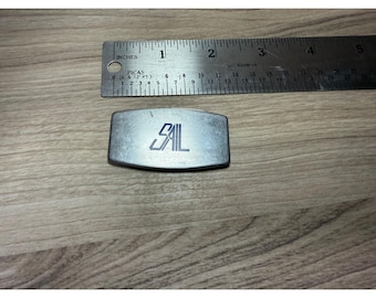 Navaja plegable Zippo vintage con clip para billetes y logo SAIL, fabricada en acero inoxidable.