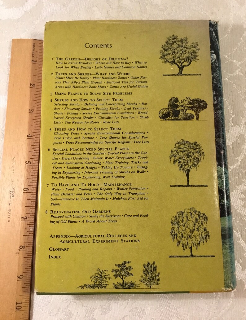 May include: A vintage book cover with a green background and a table of contents for a gardening guide. The book title is "The Garden - Delight or Dilemma?" and the chapters include "Trees and Shrubs", "Using Plants to Solve Site Problems", "Shrubs and How to Select Them", "Trees and How to Select Them", "Special Places Need Special Plants", "To Have and to Hold - Maintenance", and "Rejuvenating Old Gardens".