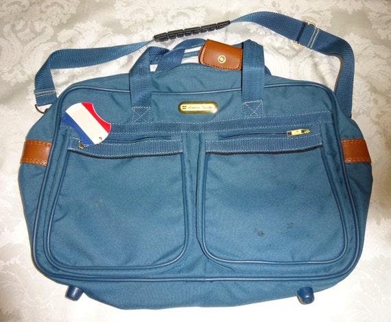 vintage american tourister carry on