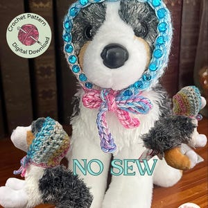 May include: A plush dog with a blue crocheted hat adorned with rhinestones and a pink and blue bow. The image includes text that reads "Jolligurumi Designs", "Crochet Pattern Digital Download", and "NO SEW". The text "Rhinestones are glued on. (Not Included)" is also present.