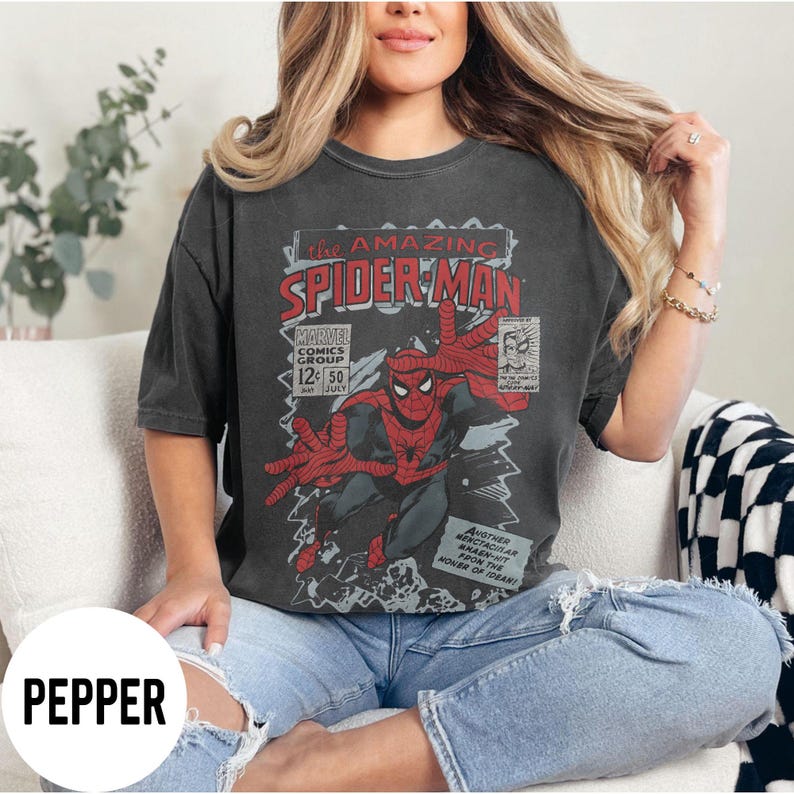 May include: A white ceramic mug with a black handle and the text "But First, Coffee" in a bold, black font. The mug is set against a neutral background, highlighting its simple design.