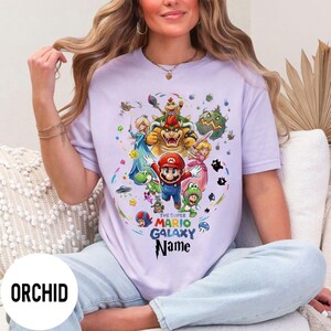 Camiseta con el nombre del póster de la película Super Mario Galaxy, Mario, Bowser, Peach, Luigi, Daisy, Yoshi, regalo de cumpleaños de Disney, viaje familiar a Disney imagen 6