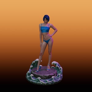 May include: A figurine of a person with short blue hair wearing a blue two-piece swimsuit and matching blue high-heeled sandals. The figure stands on a circular stone base surrounded by sculpted green and white ocean waves with foam details.