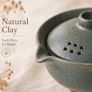 May include: A teal-colored ceramic teapot with a lid featuring multiple holes. The teapot has a textured surface and a spout. The text "Natural Clay" and "Each Piece is Unique" is visible on the left side of the image.