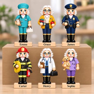 May include: Six wooden nutcracker figurines standing on individual bases labeled Emma, Grace, James, Carter, Henry, and Sophie. The figures represent various professions including a nurse, teacher, police officer, firefighter, doctor, and veterinarian.