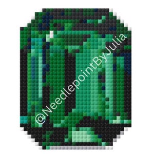 May include: A pixelated emerald gemstone design in shades of green, teal, and black. The image has a square shape with rounded corners. The text "@NeedlepointByJulia" is written on the right side of the image.