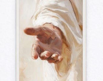May include: A framed painting depicting a hand reaching out, painted in warm tones of brown and beige. The hand is the focal point, with the artist's brushstrokes visible in the details of the skin and fabric.
