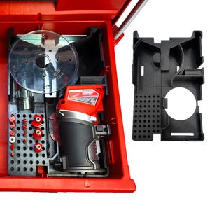 May include: A red and black power tool kit with a variety of attachments. The kit includes a compact router with a red and black housing, a clear plastic guard, and several small red and silver bits. A black storage component is on the right.