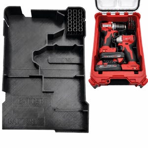 May include: A black plastic organizer with compartments labeled "BATTERY" and "IMPACT" next to a red tool case. The red case contains two red and black power tools, batteries, and drill bits. The organizer has slots for tools.