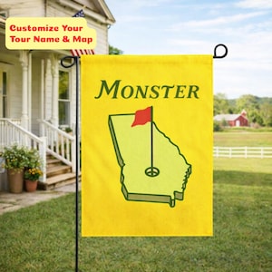 May include: A yellow garden flag with the word "MONSTER" in green. The flag features a green outline of the state of Georgia with a golf pin and red flag. The text "Customize Your Tour Name & Map" is in a yellow box.