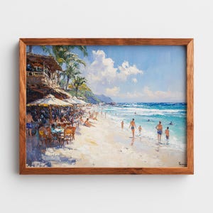 May include: A framed oil painting of a beach scene. The artwork shows a beach with people, umbrellas, and a restaurant. The ocean is blue, and the sky is filled with clouds. The frame is made of wood.