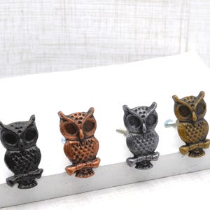 May include: A rustic wooden sign with the text "Welcome to our home" in white lettering. The sign features a distressed finish and a simple, inviting design, perfect for front door decor.