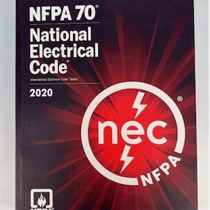 May include: A book titled "NFPA 70 National Electrical Code 2020". The cover is dark red with white text and a circular logo featuring "nec" and lightning bolts. The NFPA logo is in the lower left corner.