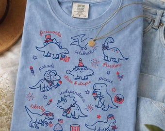 Cute Patriotic Dinosaur American Flag Fireworks Shirt, Kids 4th Of July Patriotic Dino Tee, USA Flag Toddler Independence Day Outfit Shirt